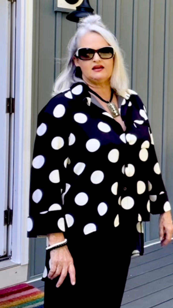 Polka Dot Perfection: Collared Button-Through Blouse with High-Low Hem