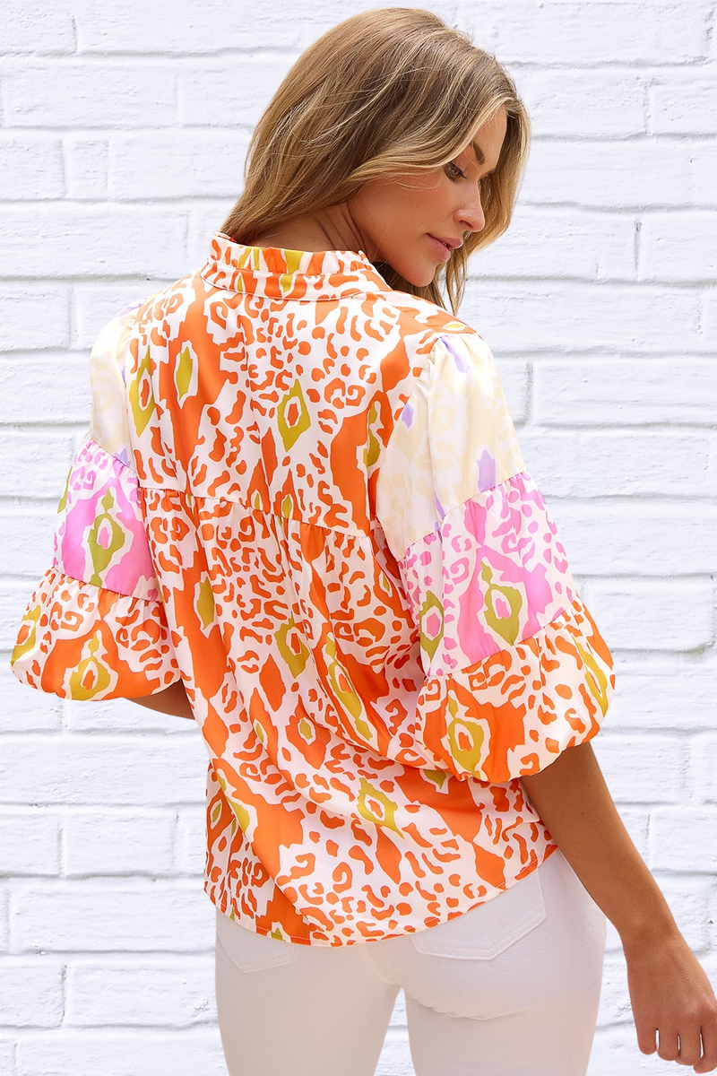 Tangerine Printed Notched Half Sleeve Blouse