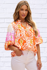 Tangerine Printed Notched Half Sleeve Blouse