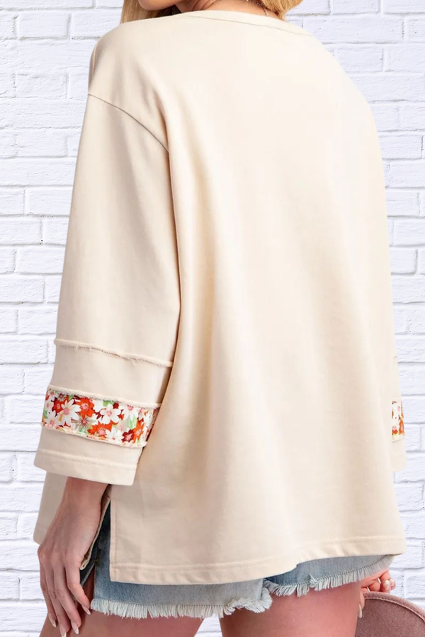 Exposed Seam Slit Floral Round Neck Blouse